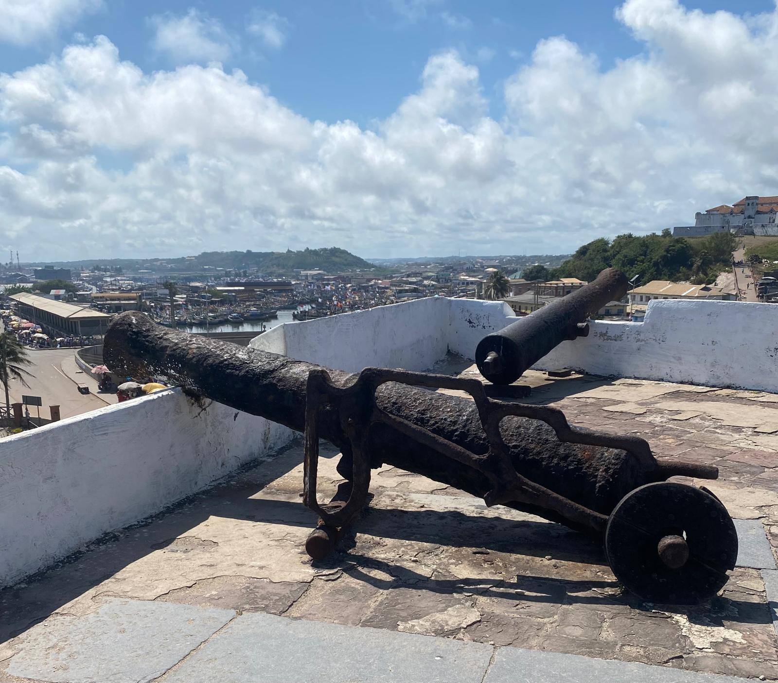 A weathered cannon on the ramparts above Elmina’s harbour