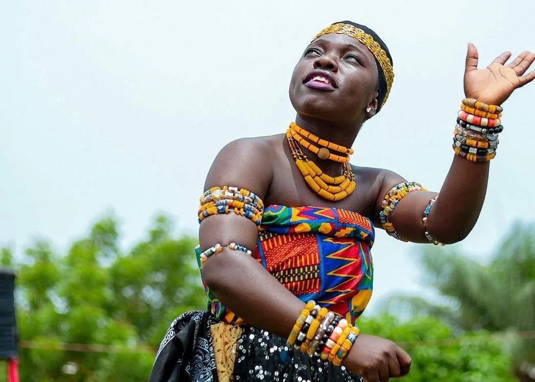 A woman in colourful Ghanaian attire, as featured in the Black History Month editorial